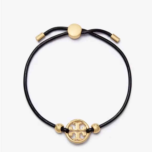 Tory Burch Jewelry - Elegant Gold and Black Emblem Bracelet